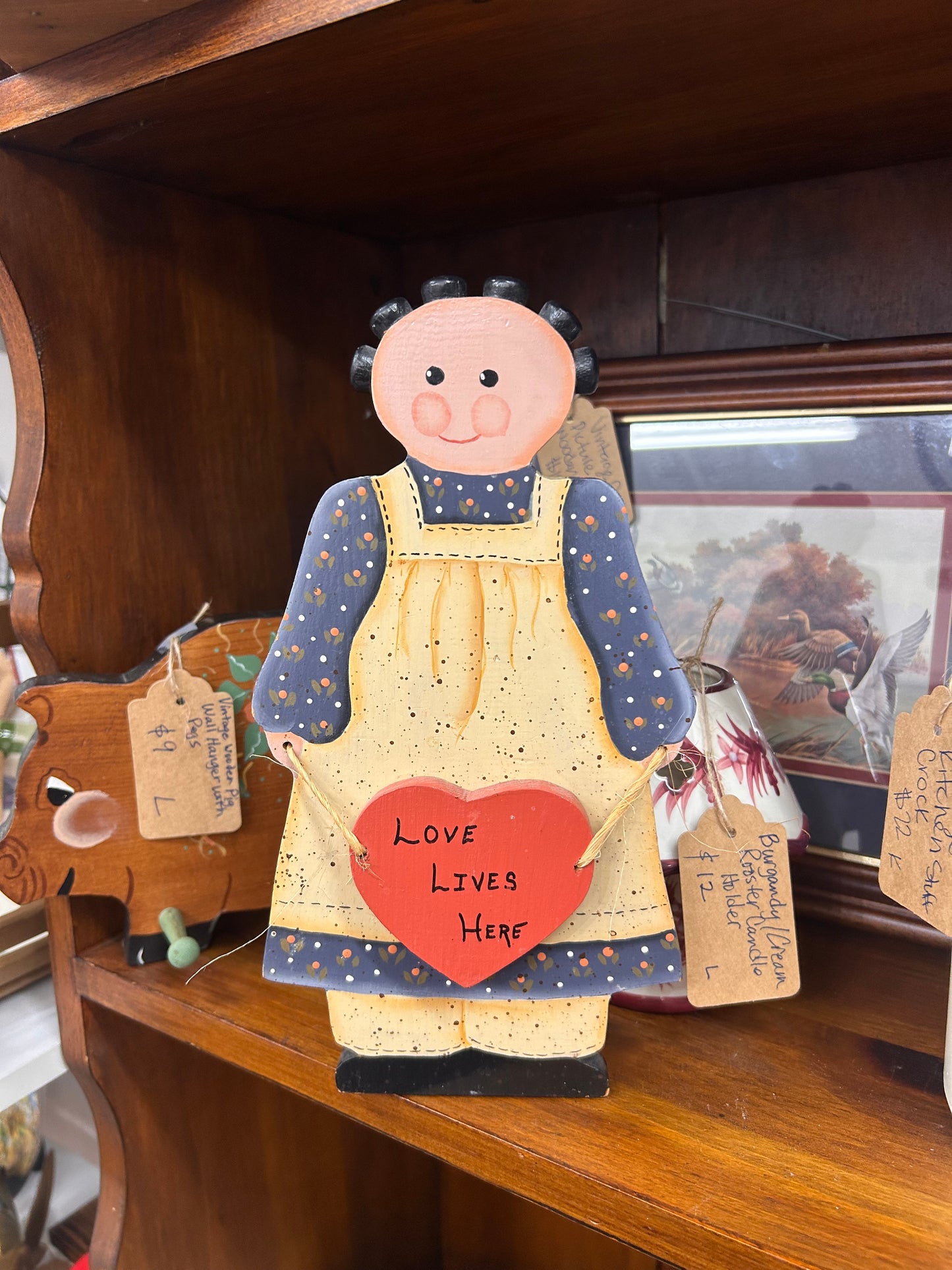 Vintage Wooden Girl “Love Lives Here”