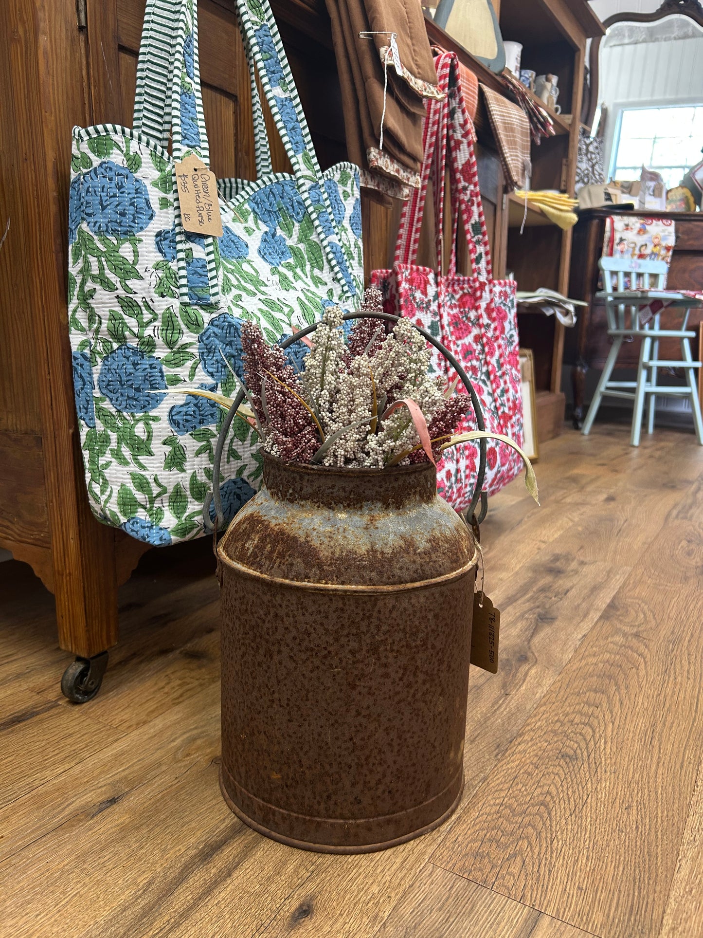 Primitive Can With Flowers